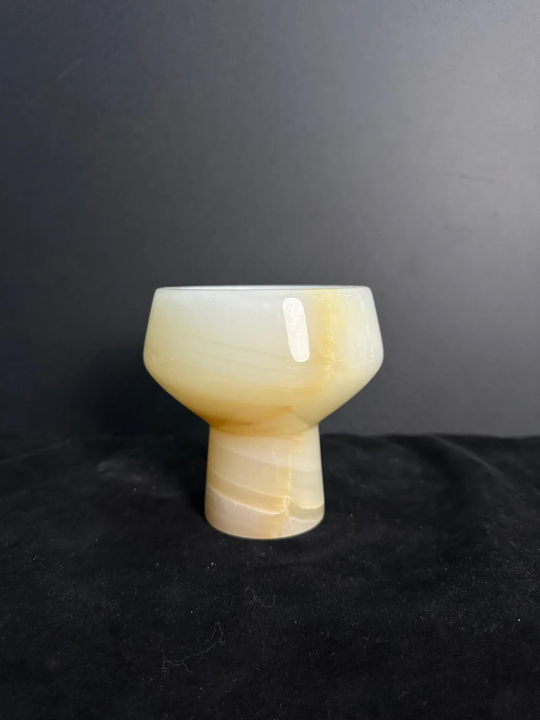 Carved natural stone candle holder